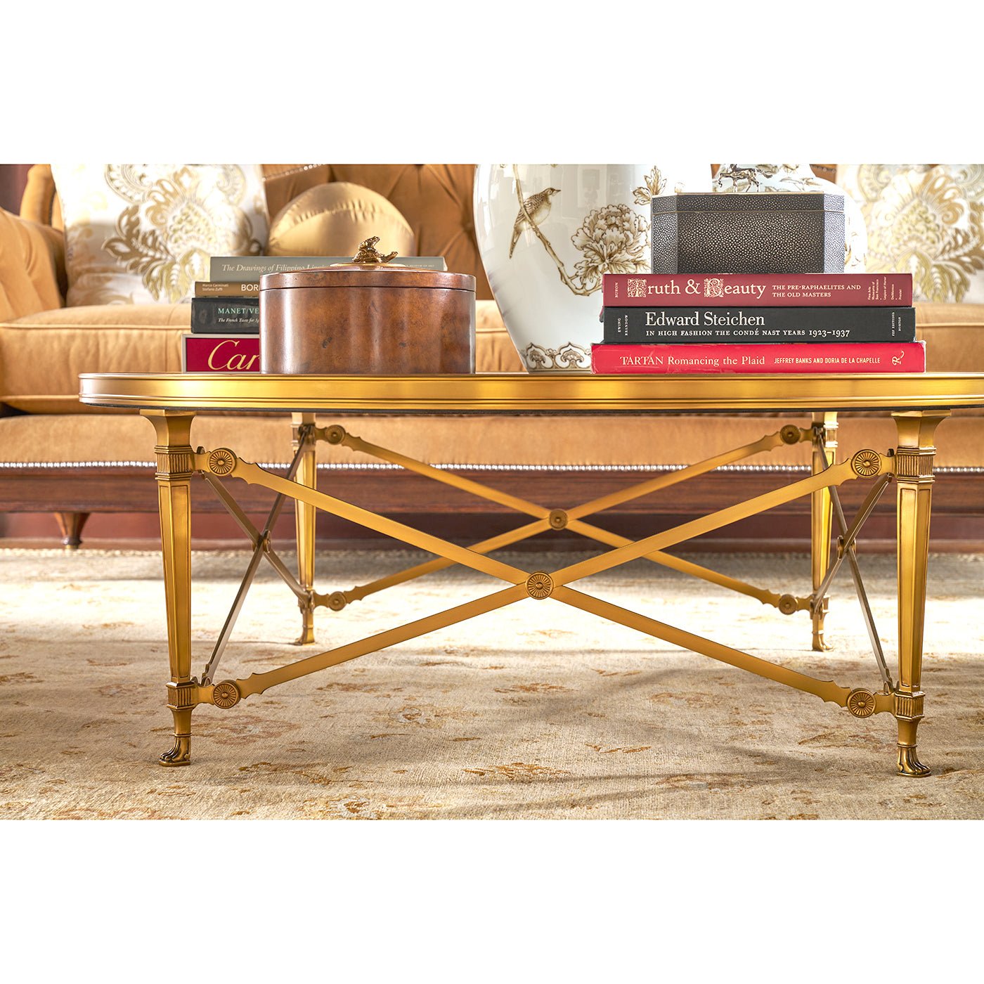 Coffee table with decorative items in cozy setting.