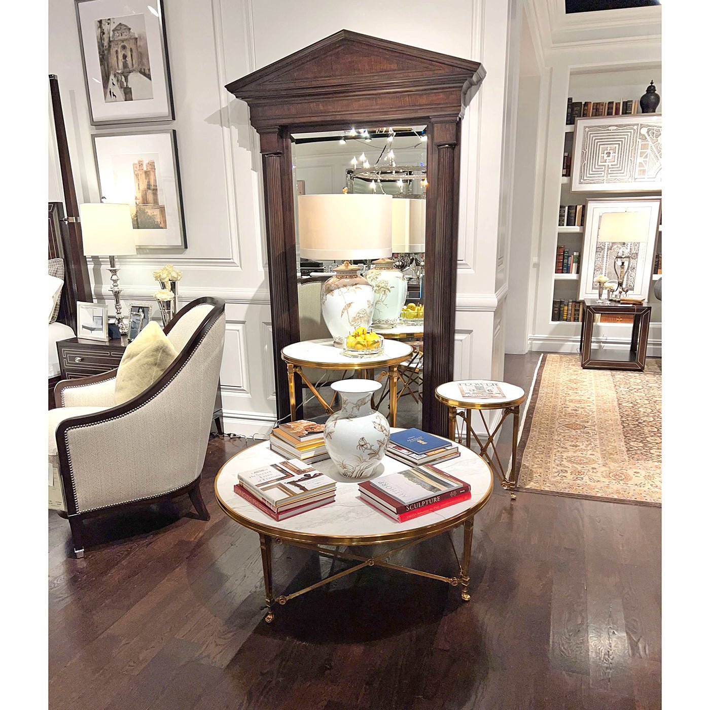 Living room with round end table and matching decor.