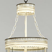 Close-up of French ivory lantern top design.