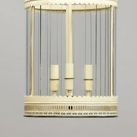 Bottom section French ivory lantern with light fixtures.