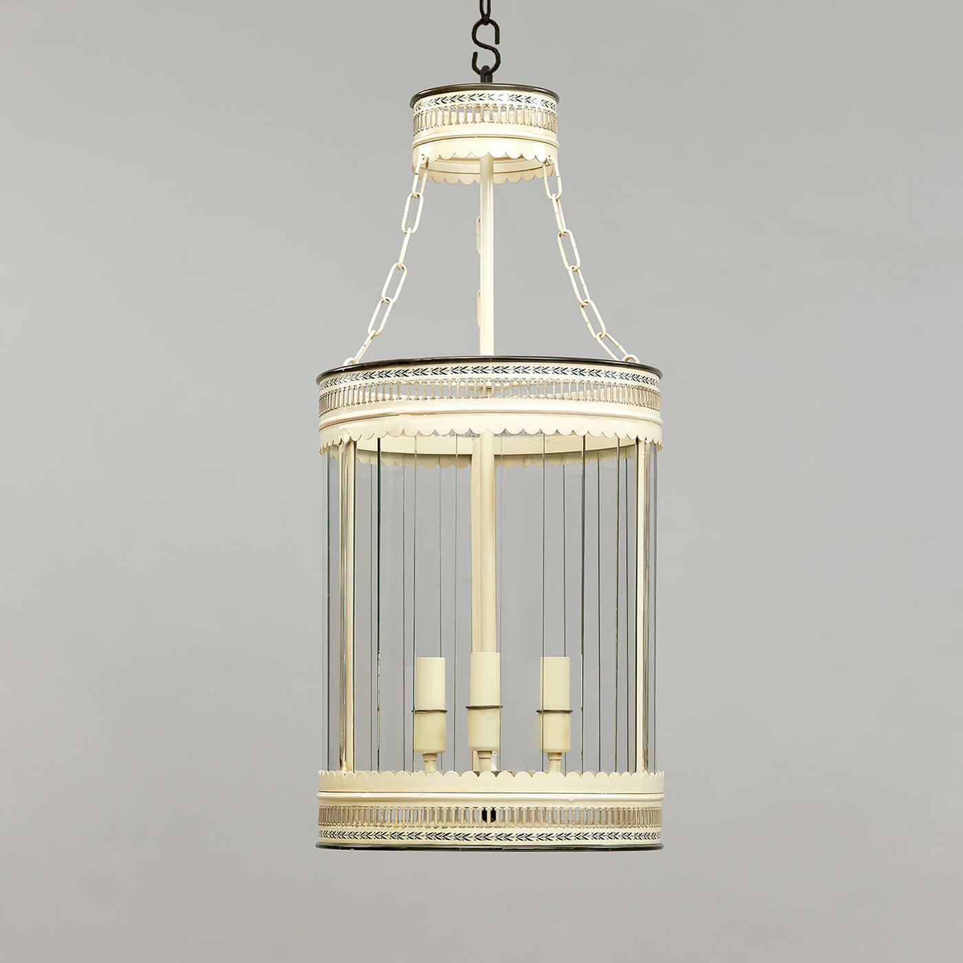 Detailed view of French ivory lantern on gray background.