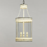 Detailed view of French ivory lantern on gray background.