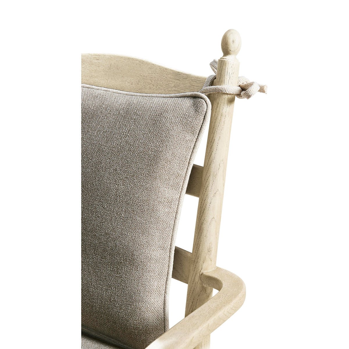 Close-up of cushion and ladderback design, arm chair.