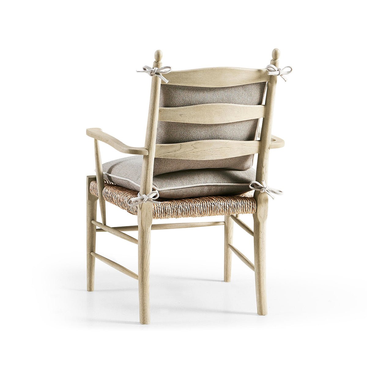 Back view of cushioned ladderback arm chair, detailed design.