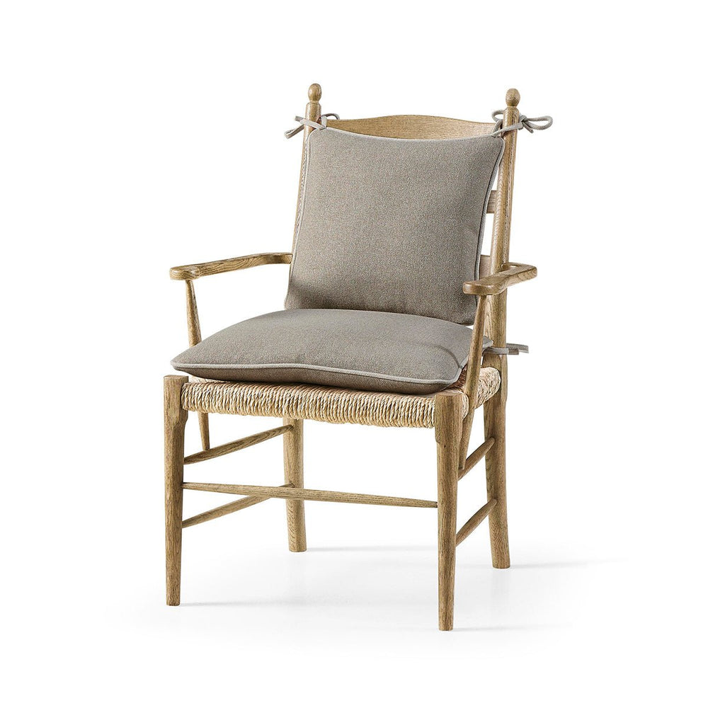 French ladderback arm chair with cushion, front angle view.