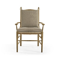 Ladderback arm chair with cushion, head-on view.