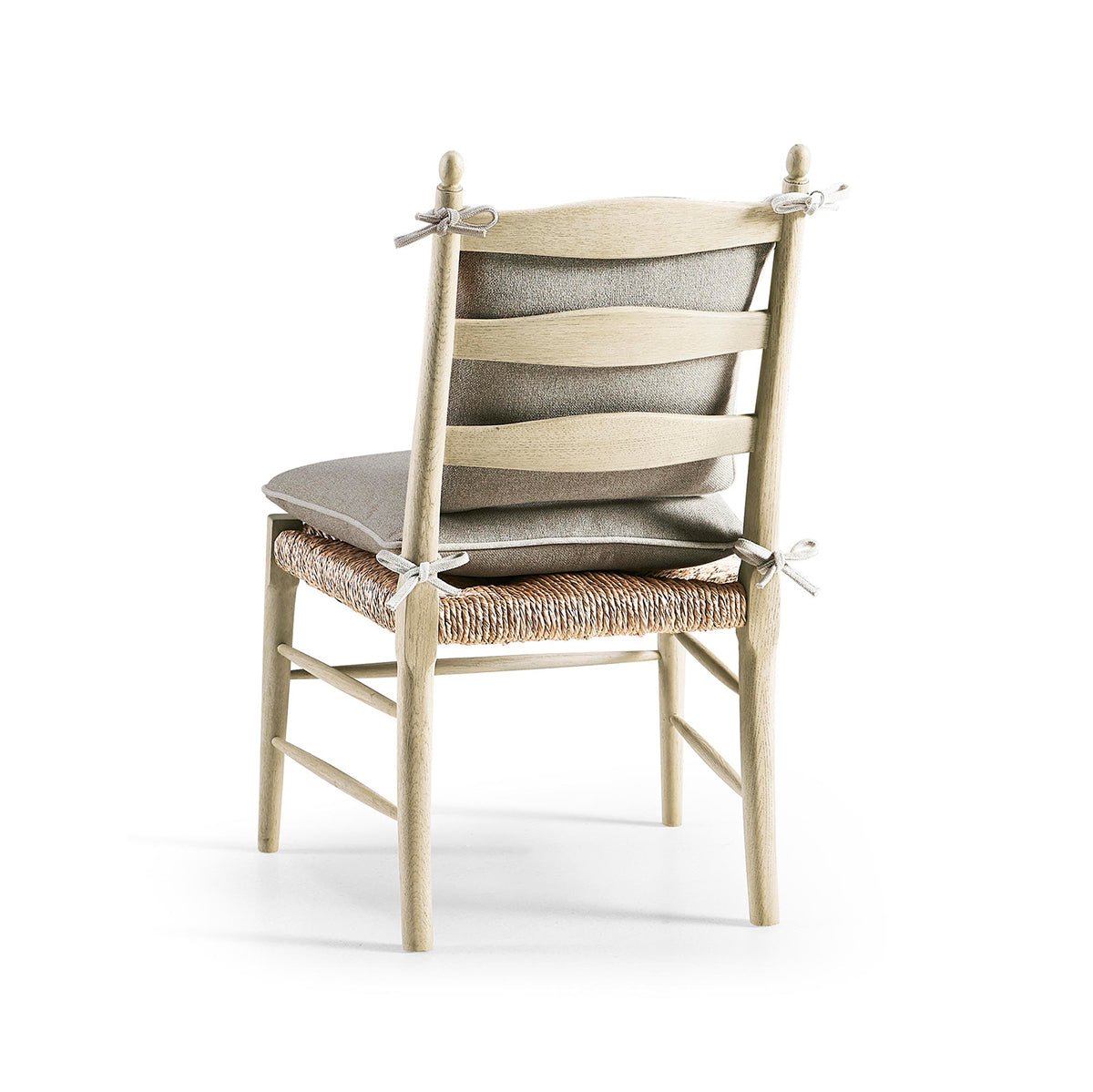 Ladderback dining chair with cushions, rear view.