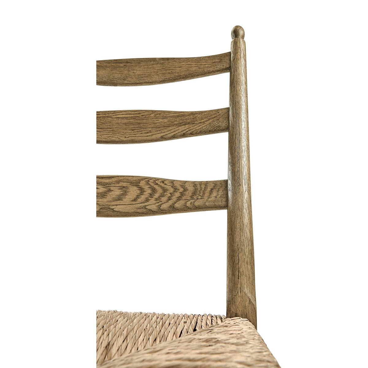 Detail of ladderback chair wood finish and seat.