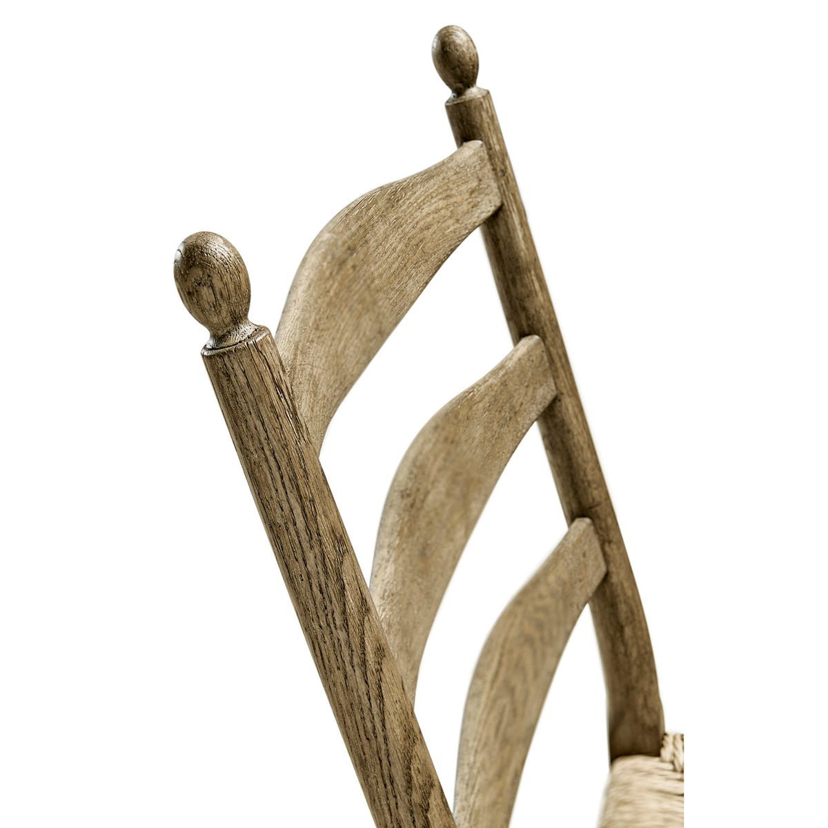 Ladderback chair wood design detail.