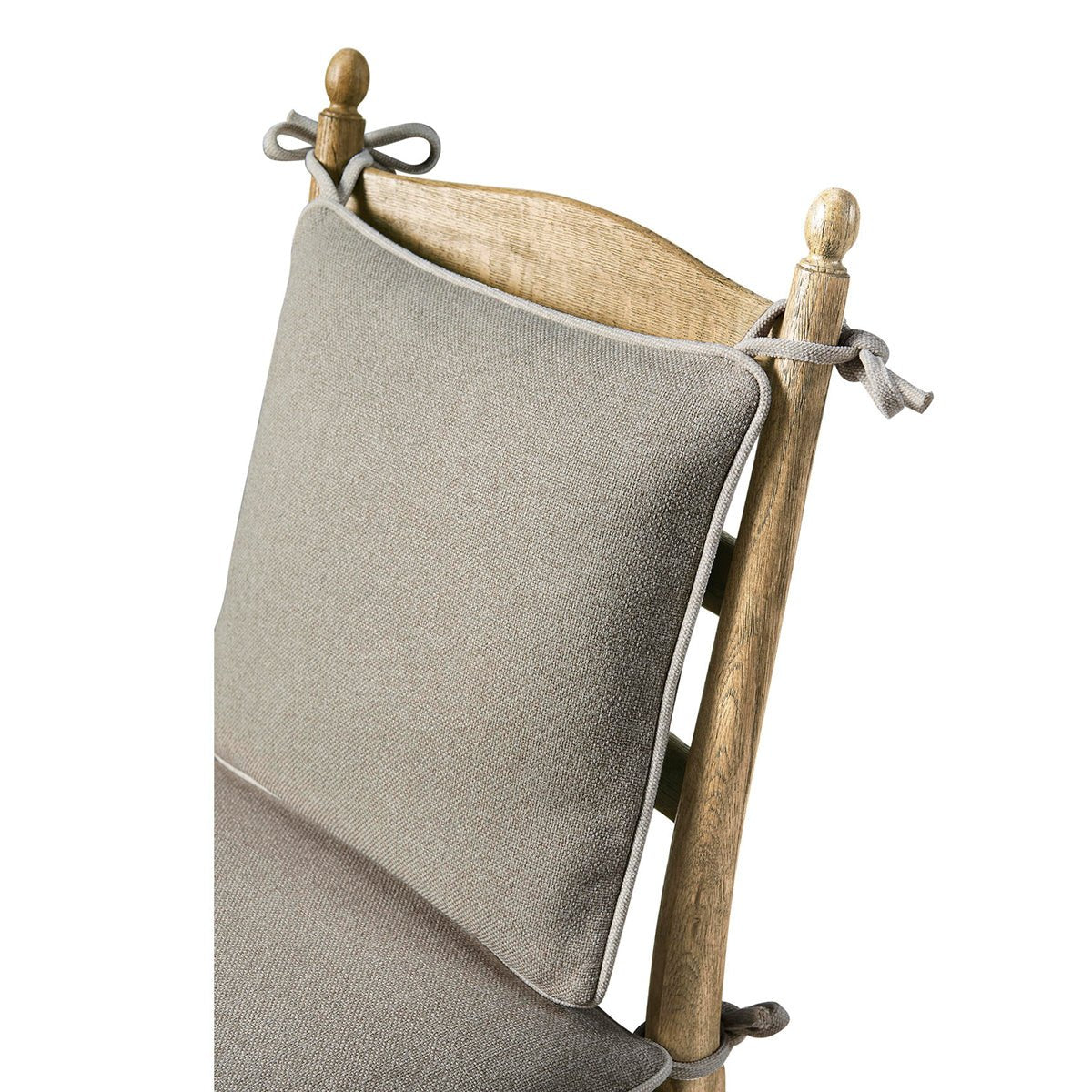 Ladderback chair top and cushion tie details.