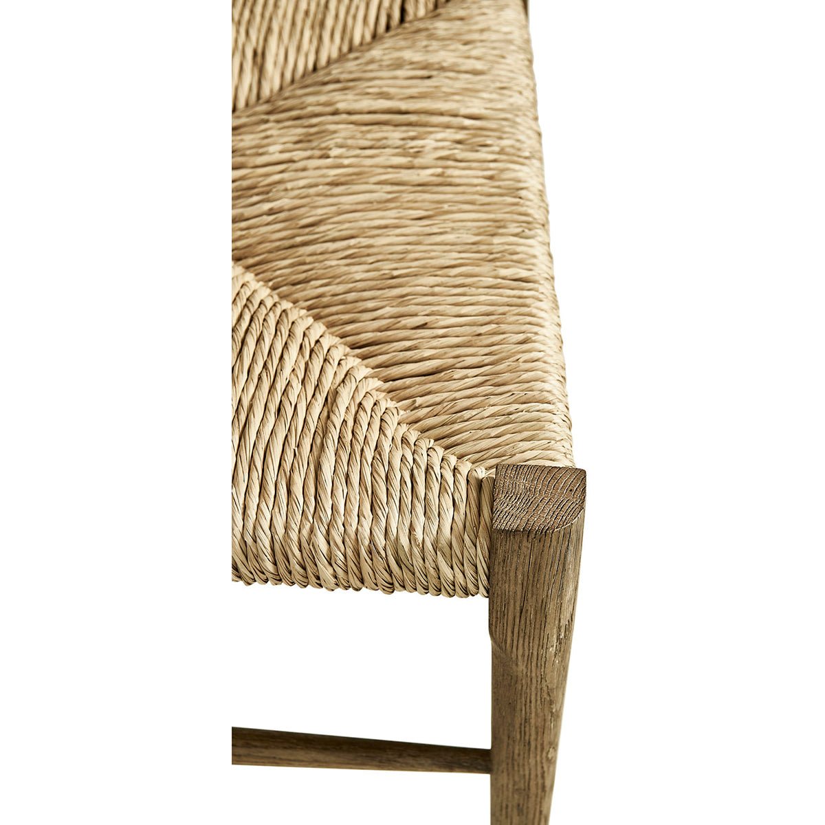 Close-up of woven seat on ladderback chair.