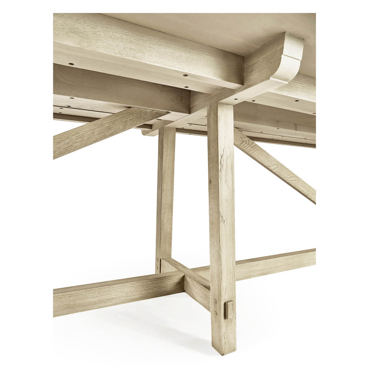 Underside view of dining table, showing leg details.