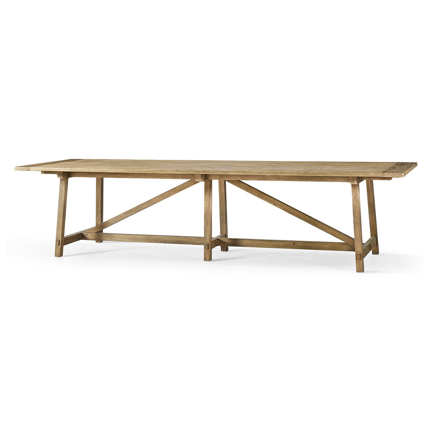 Long wooden dining table with trestle base, front view.