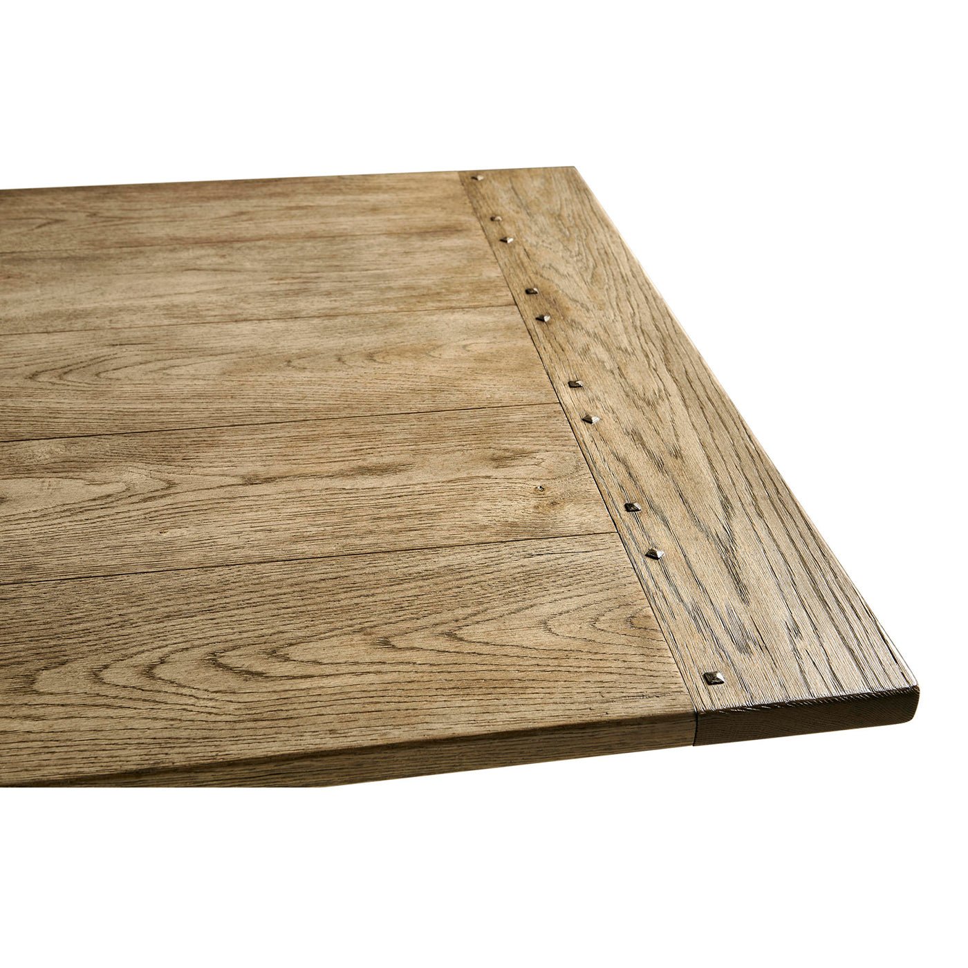 Corner close-up of wooden dining table extension.