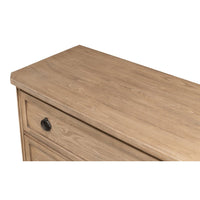 Close-up of dresser top, showcasing light oak texture.