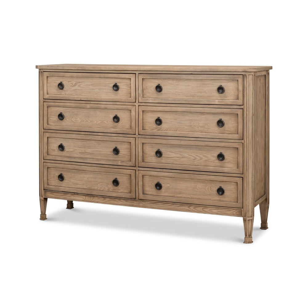 Front view of eight-drawer light oak dresser.