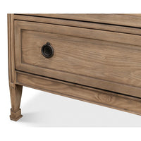 Lower section of oak dresser with leg design.