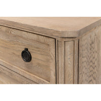 Close-up of nightstand corner and drawer details.