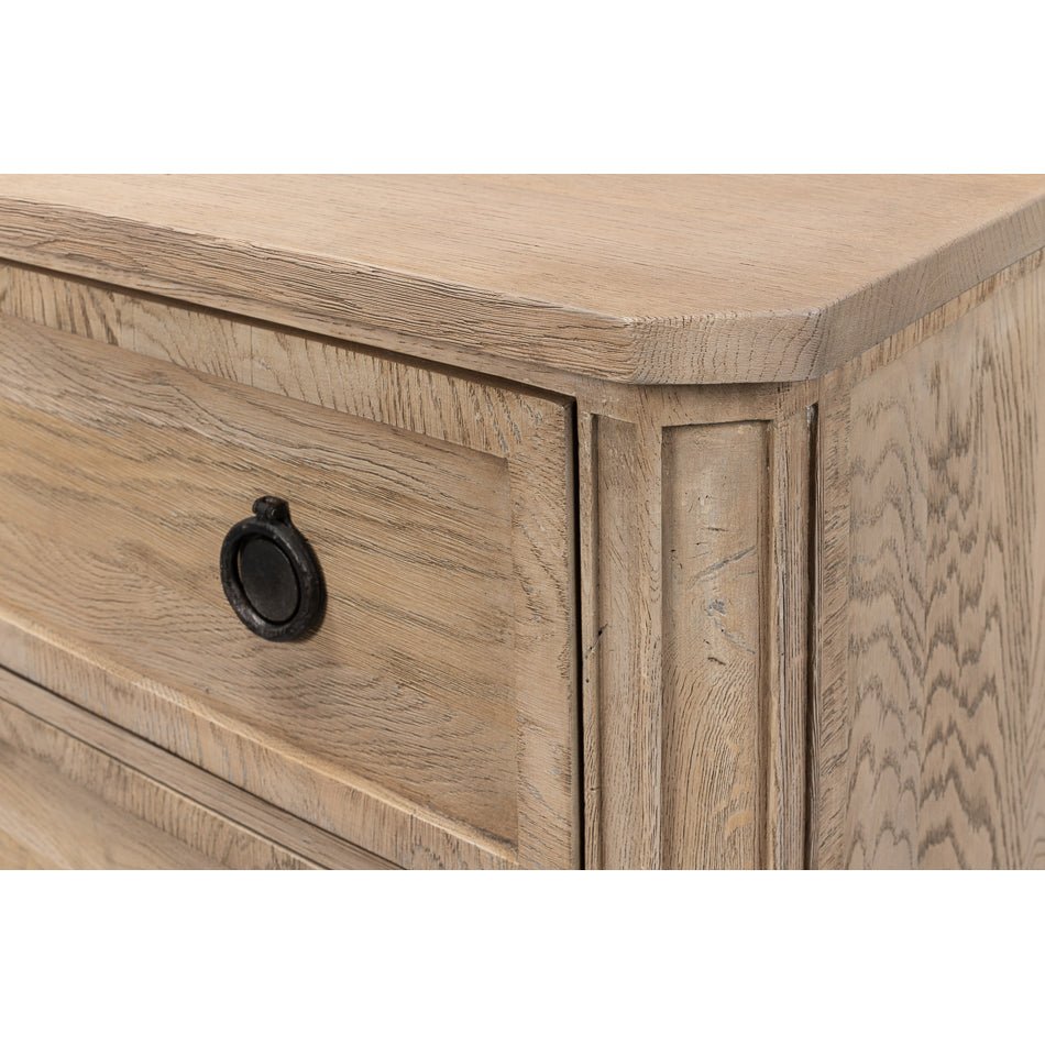 Close-up of nightstand corner and drawer details.