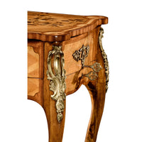 Ornate corner detailing on French side table.