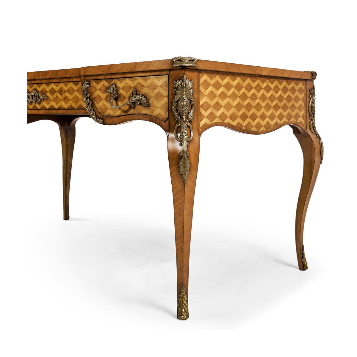 Angled view of desk highlighting parquet pattern and elegant legs.