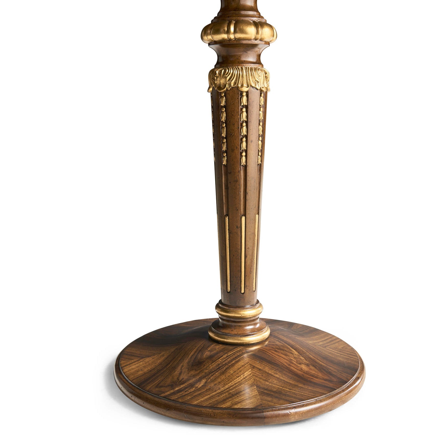 French accent table’s wooden base and detailed leg design.