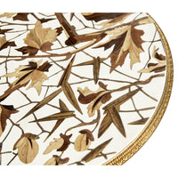 Close-up of floral inlay on accent table top.