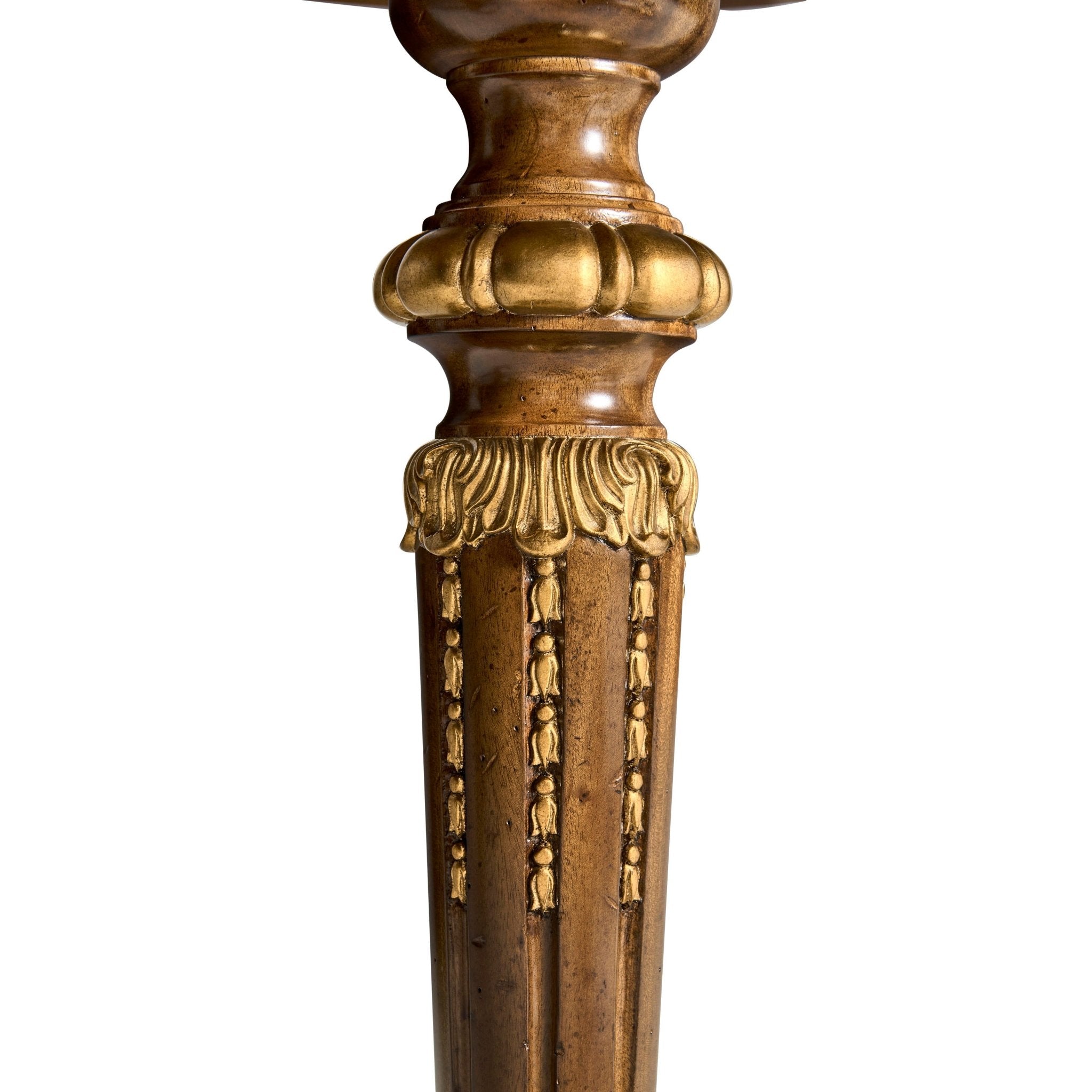 Close-up of ornate detailing on accent table leg.
