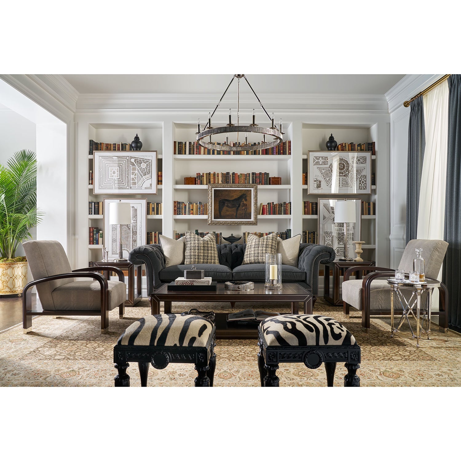 Living room featuring two zebra vanity stools, cozy decor.