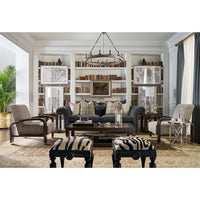 Living room featuring two zebra vanity stools, cozy decor.