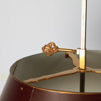 Detailed lamp shade holder of French bouillotte lamp.