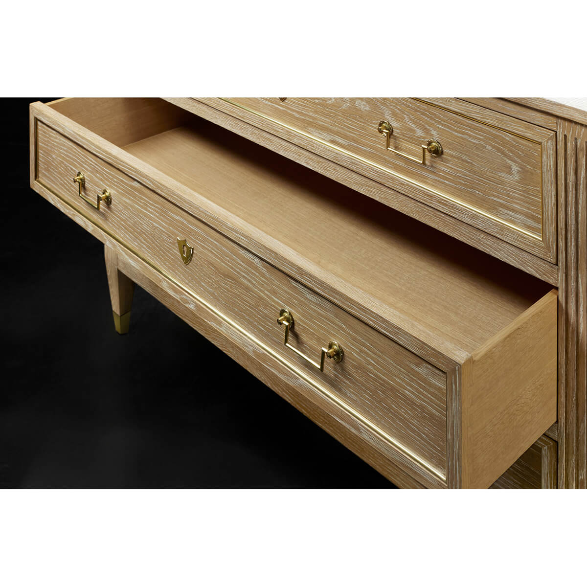 Open drawer detail on French Louis XVI commode.