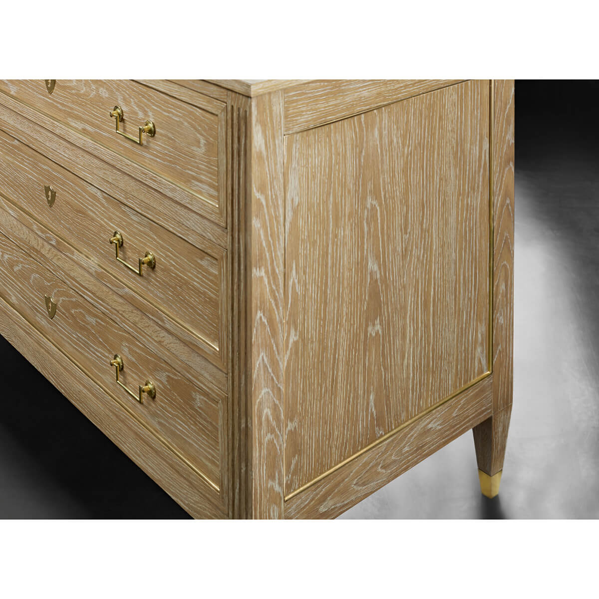 Close-up of wood grain on French Louis XVI commode side.