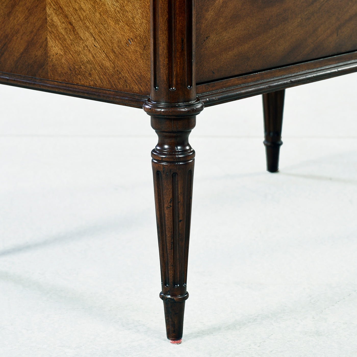 French Louis XVI nightstand, detailed leg carving.