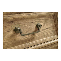 French commode close-up, vintage drawer handle.