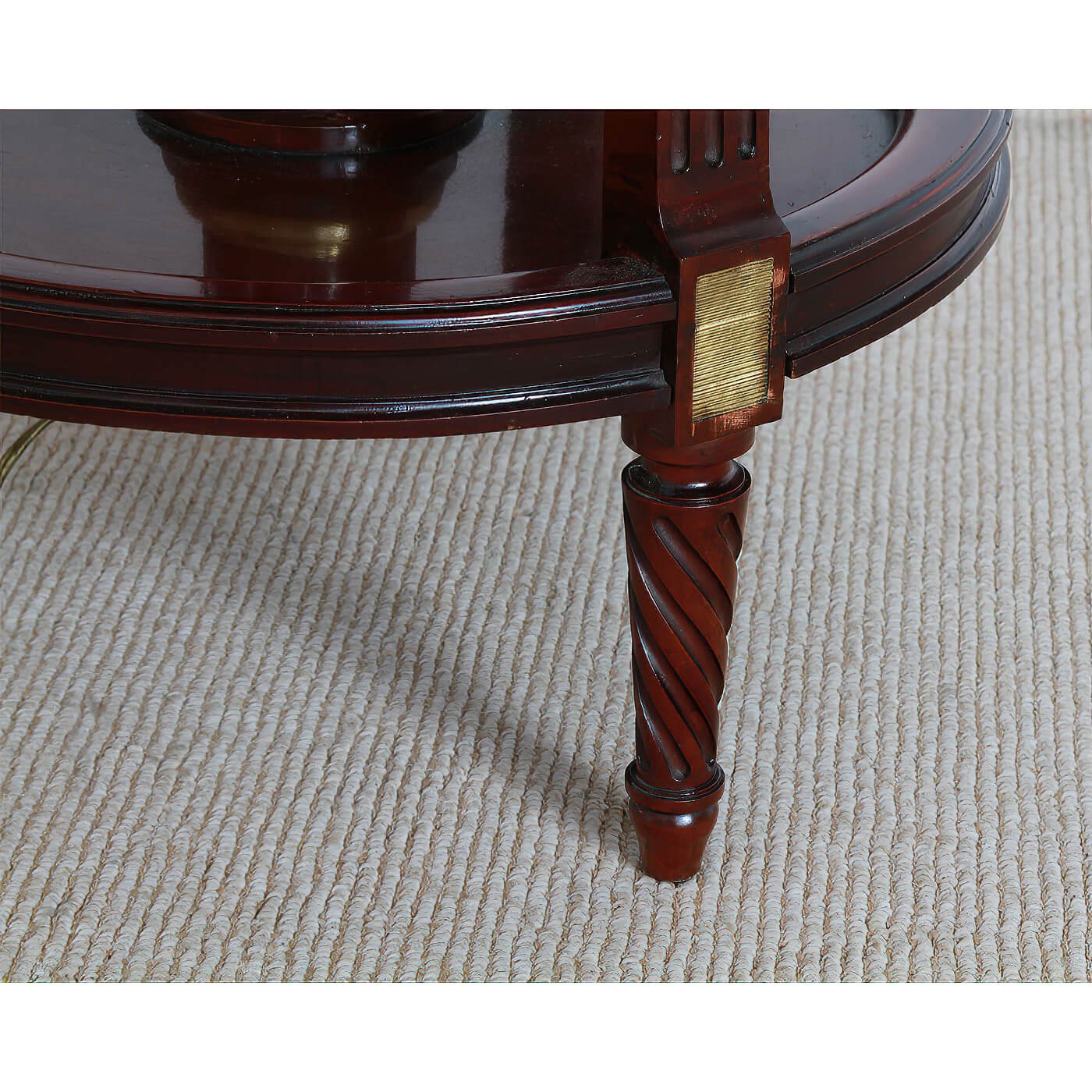 Decorative lamp leg with twisted wood design.