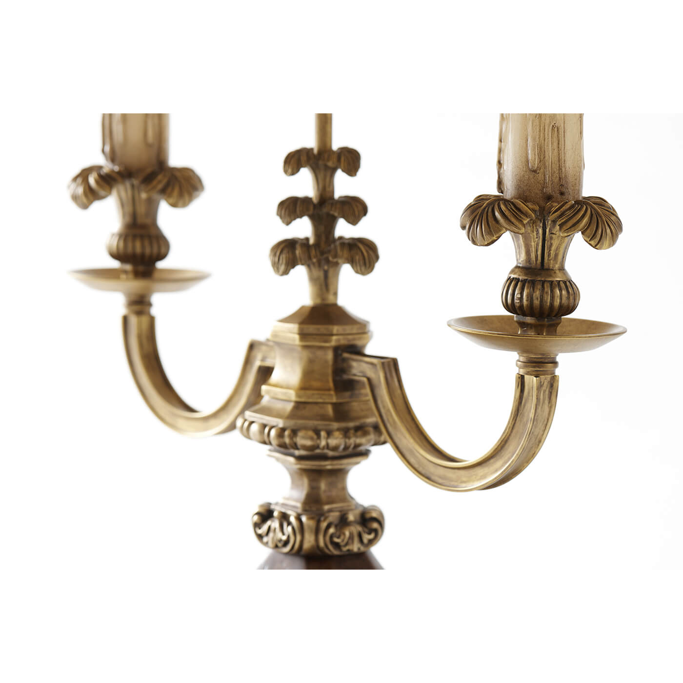Detailed view of lamp's ornate arm design.