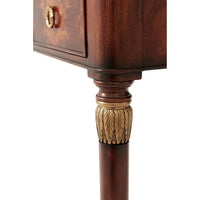 Close-up of decorative leg detail on French mahogany desk.