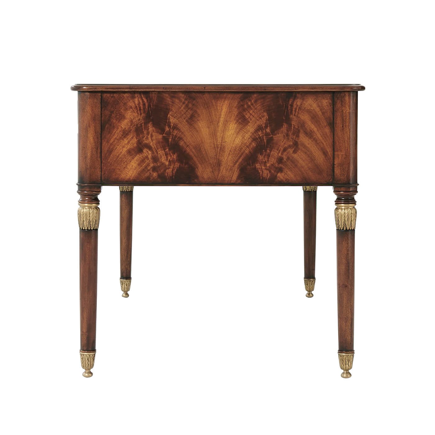 Side view of French mahogany desk with decorative legs.