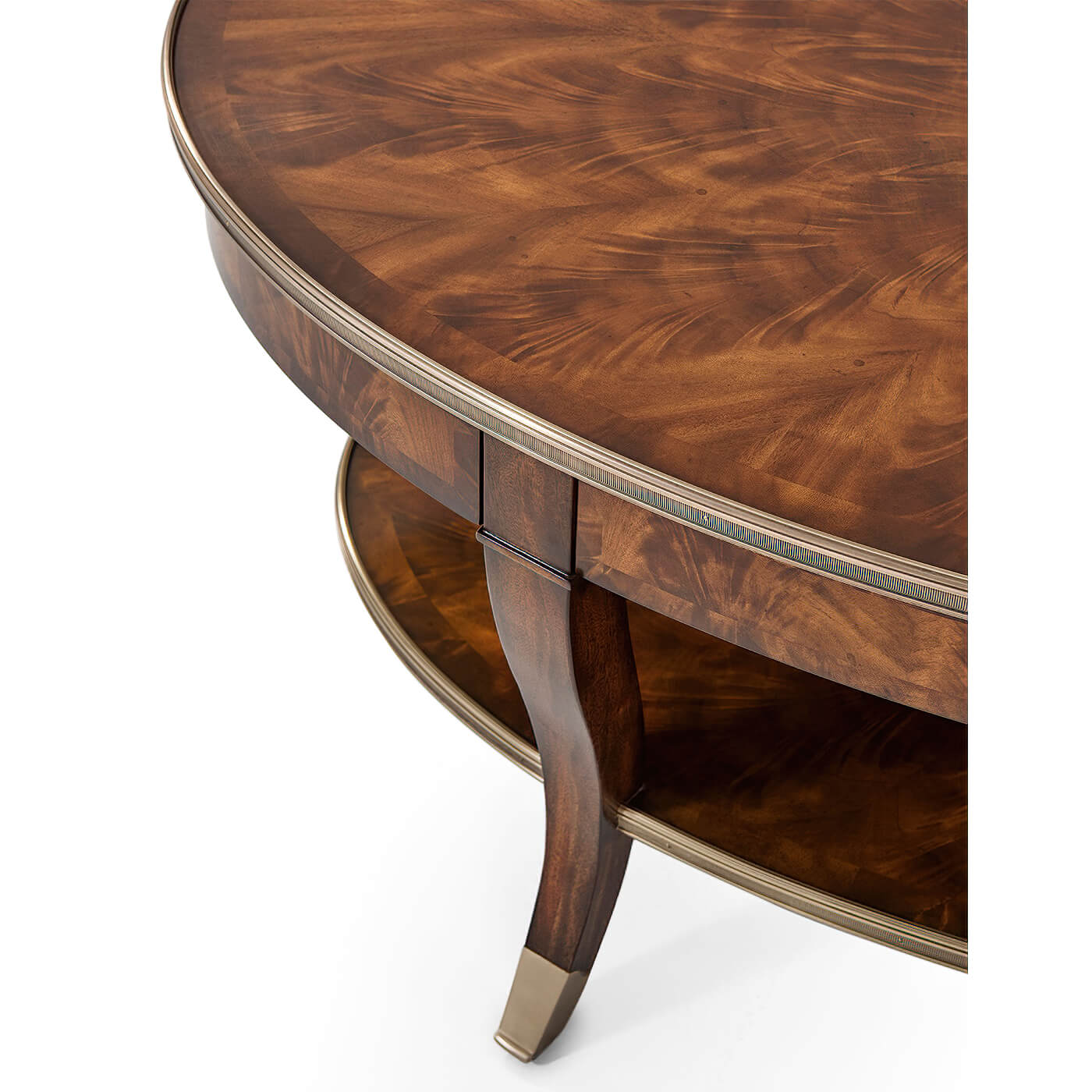 Close-up of mahogany cocktail table corner and lower shelf.