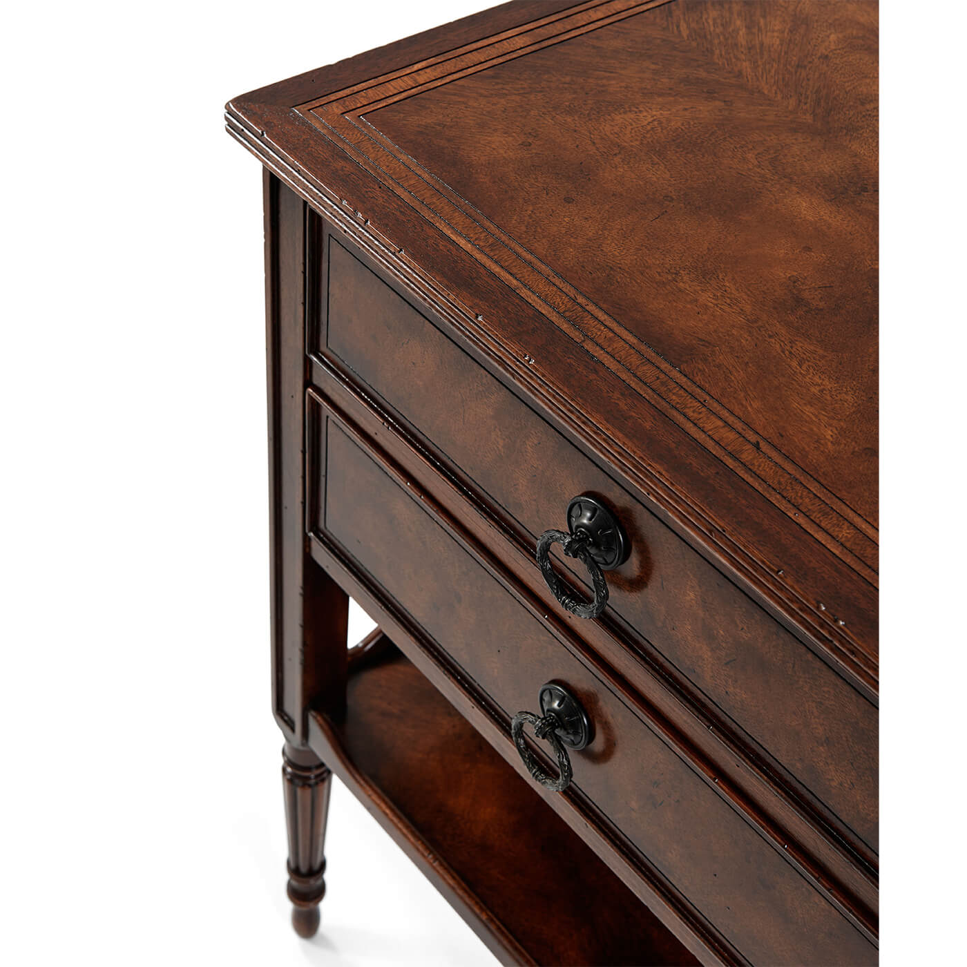 Angled top view of mahogany side table and drawers.