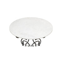 Overhead view of marble tabletop on elegant base.