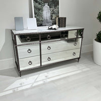 French dresser with marble top in modern setting.