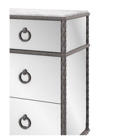 Close-up of dresser detailing and mirrored finish.