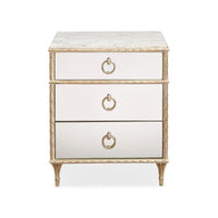 Front view of gold French marble top nightstand.