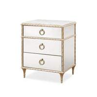 Gold French marble top nightstand angled view.