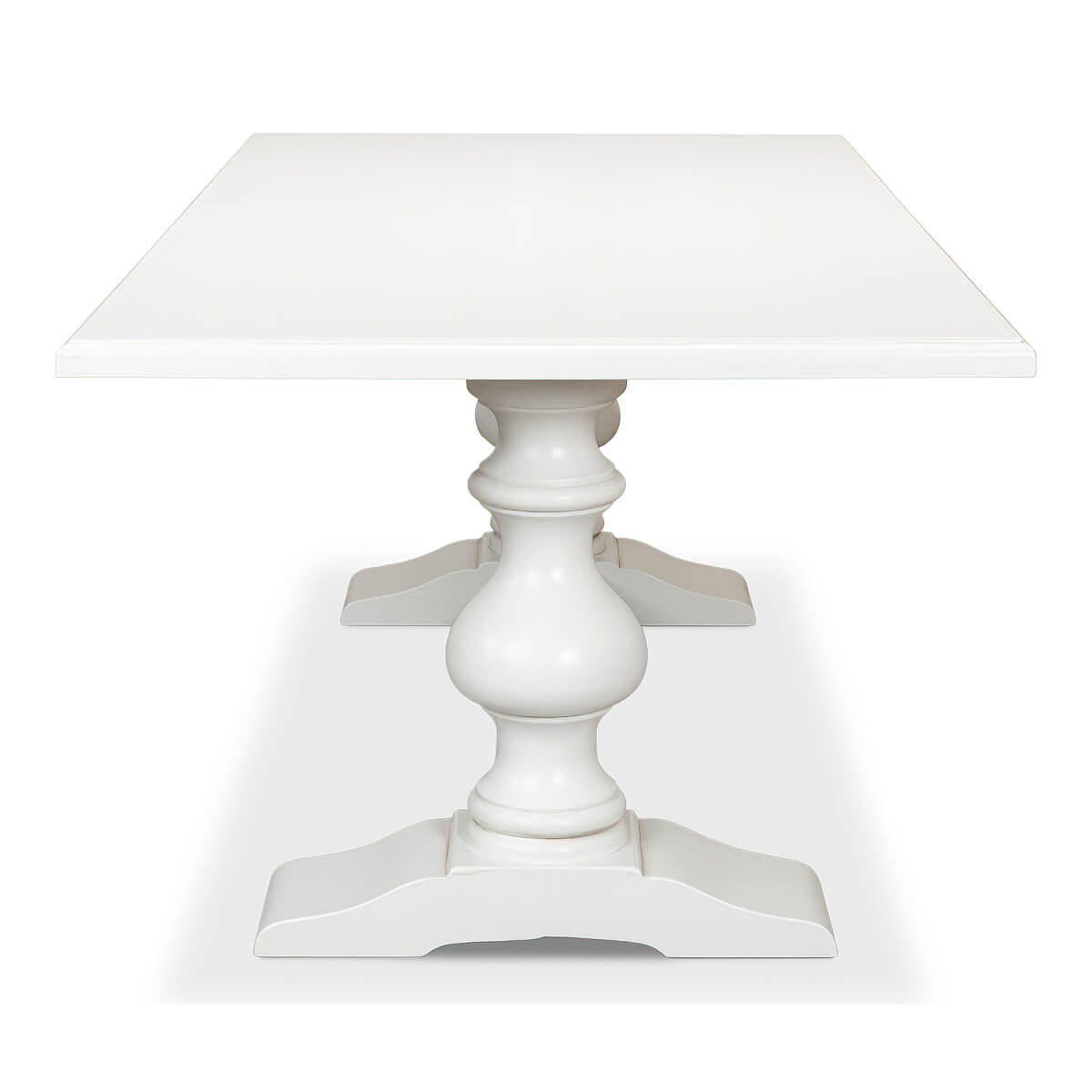 End view of white refectory table showing legs.