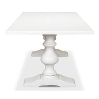 End view of white refectory table showing legs.