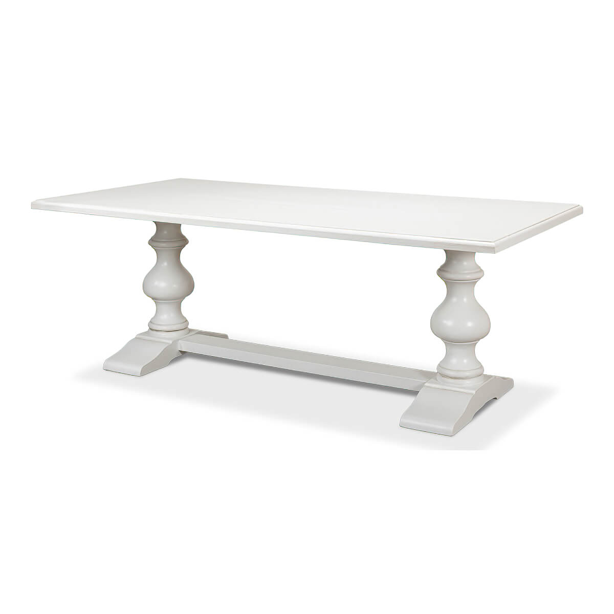 Angled view of white refectory table showing legs.