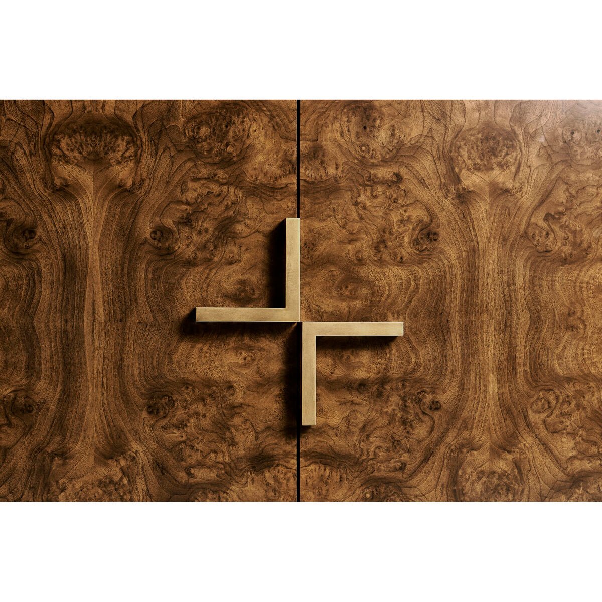 Close-up of sideboard cross handle detail.